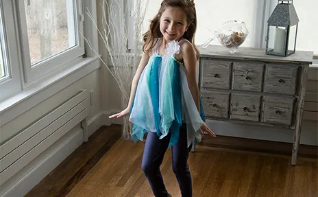 girl dancing in blue dress