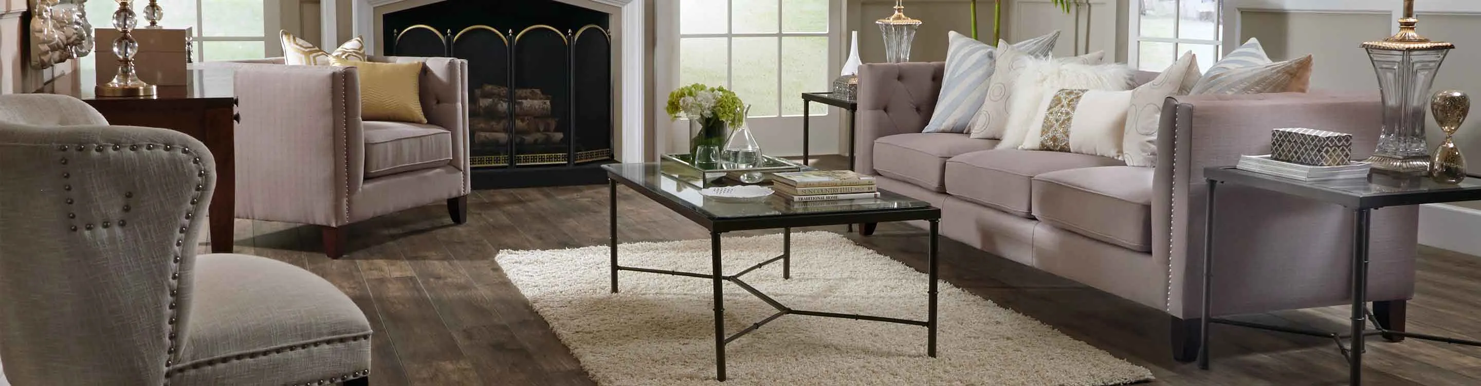 Laminate flooring in living room with furniture and fireplace